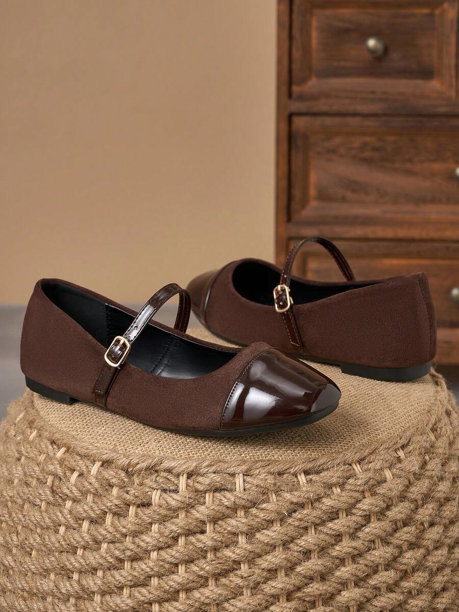 Pair of women's square toe slip-on flat shoes featuring a delicate bow detail and low vamp design.