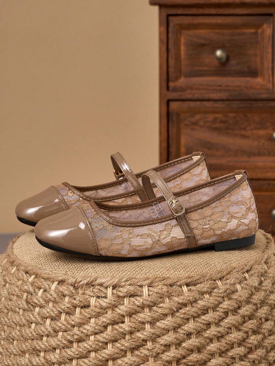 Pair of women's square toe slip-on flat shoes featuring a delicate bow detail and low vamp design.
