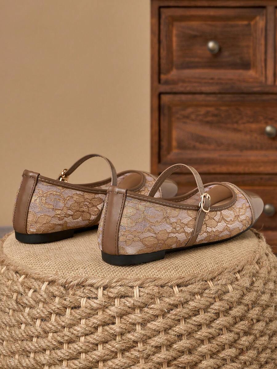 Pair of women's square toe slip-on flat shoes featuring a delicate bow detail and low vamp design.