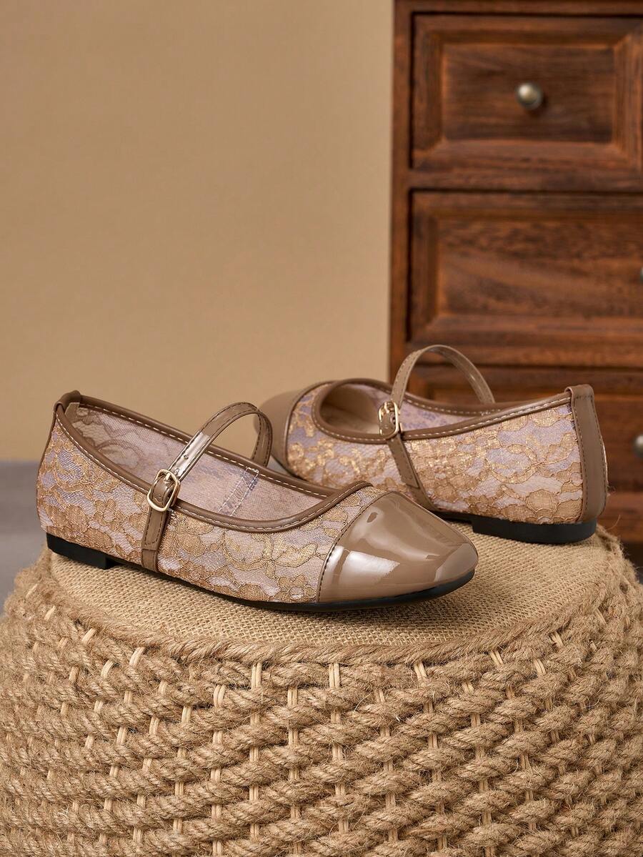 Pair of women's square toe slip-on flat shoes featuring a delicate bow detail and low vamp design.