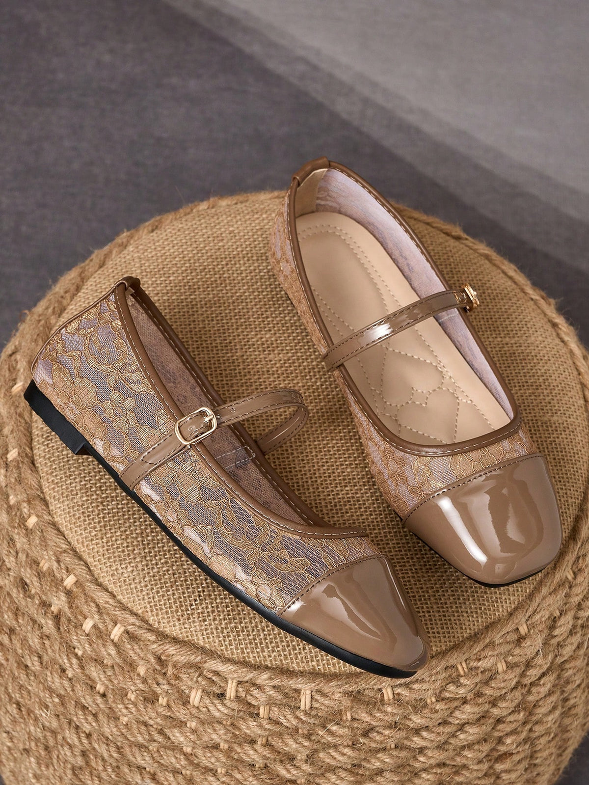 Pair of women's square toe slip-on flat shoes featuring a delicate bow detail and low vamp design.
