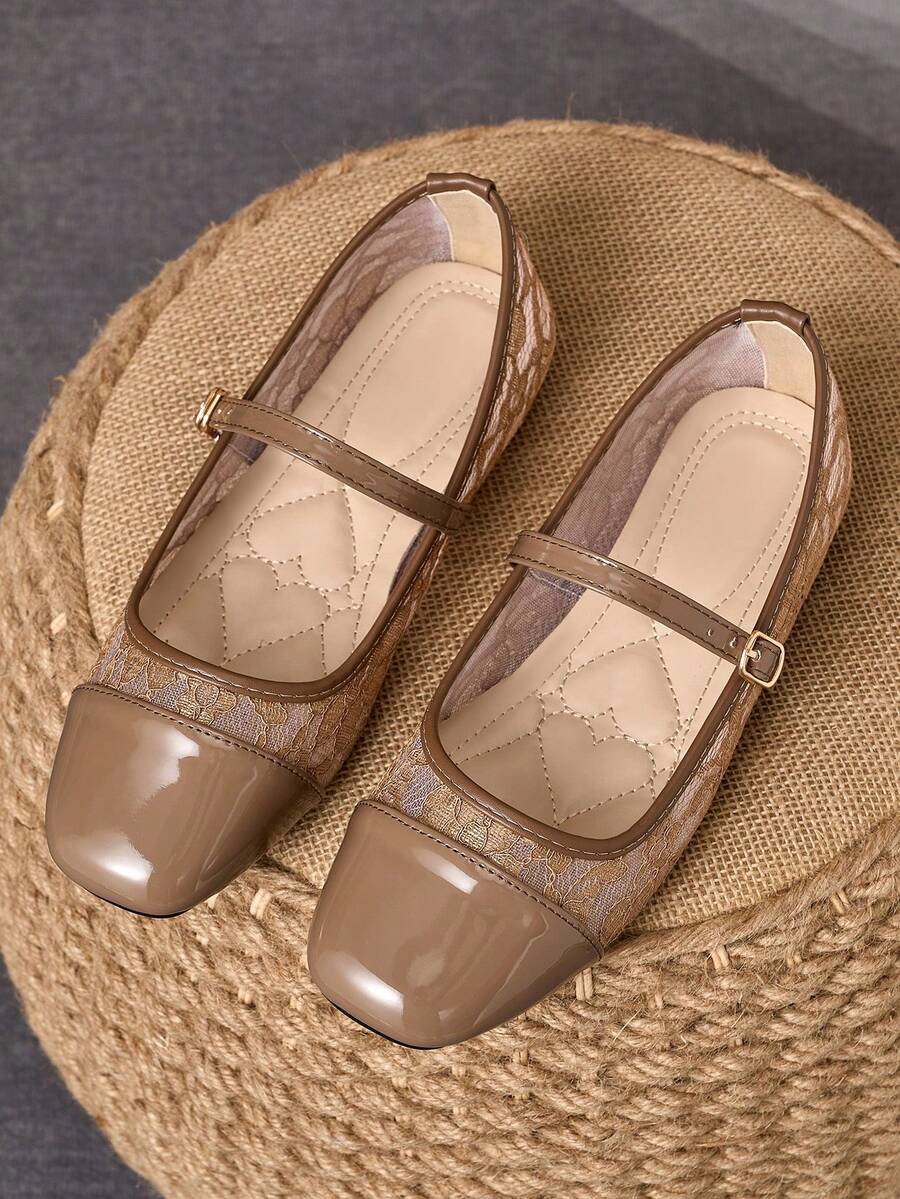 Pair of women's square toe slip-on flat shoes featuring a delicate bow detail and low vamp design.