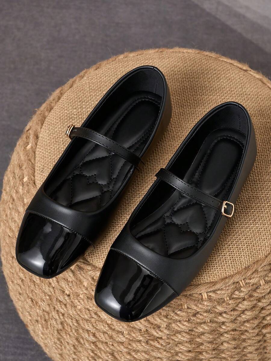 Pair of women's square toe slip-on flat shoes featuring a delicate bow detail and low vamp design.