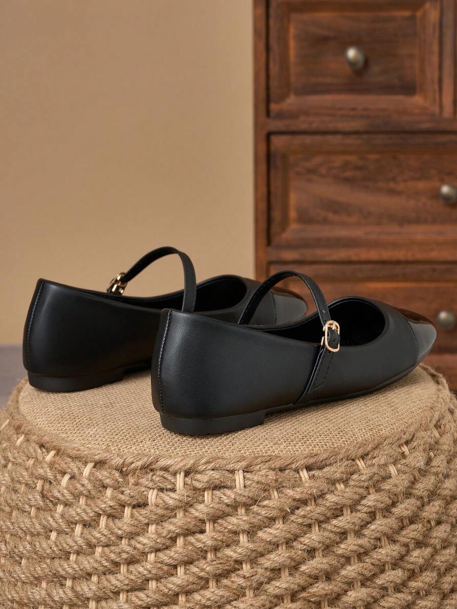 Pair of women's square toe slip-on flat shoes featuring a delicate bow detail and low vamp design.