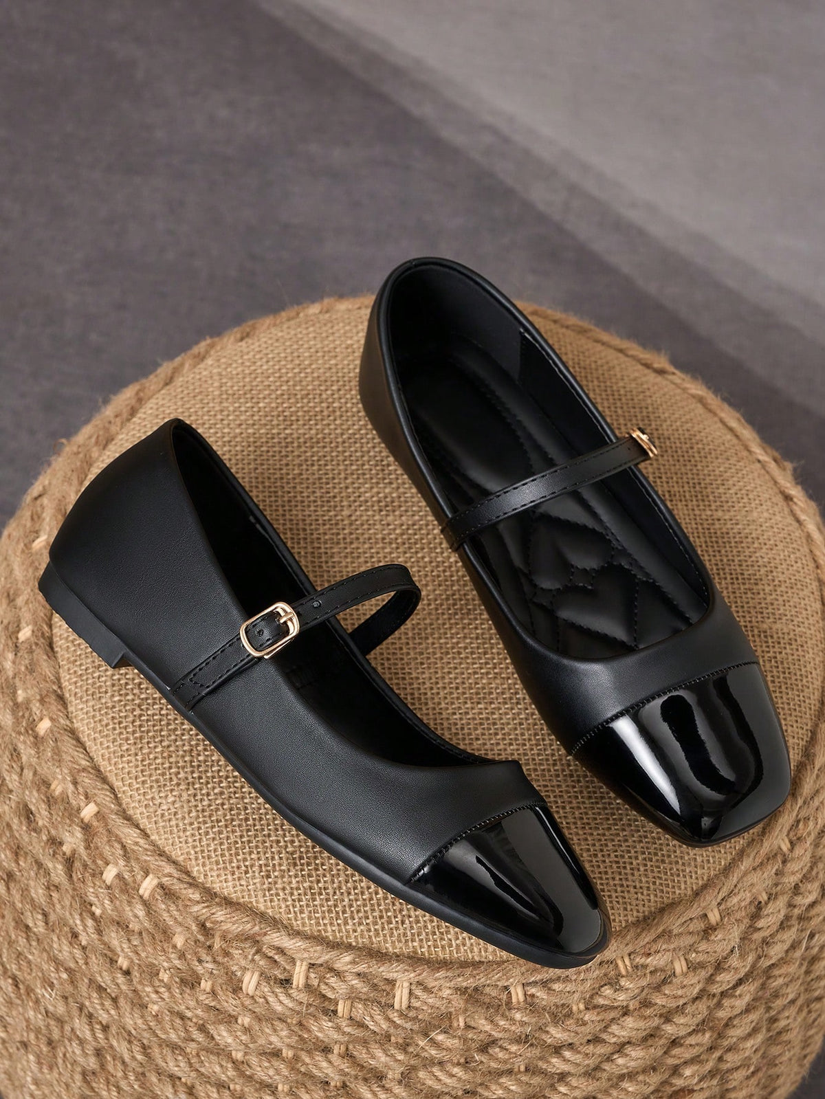 Pair of women's square toe slip-on flat shoes featuring a delicate bow detail and low vamp design.