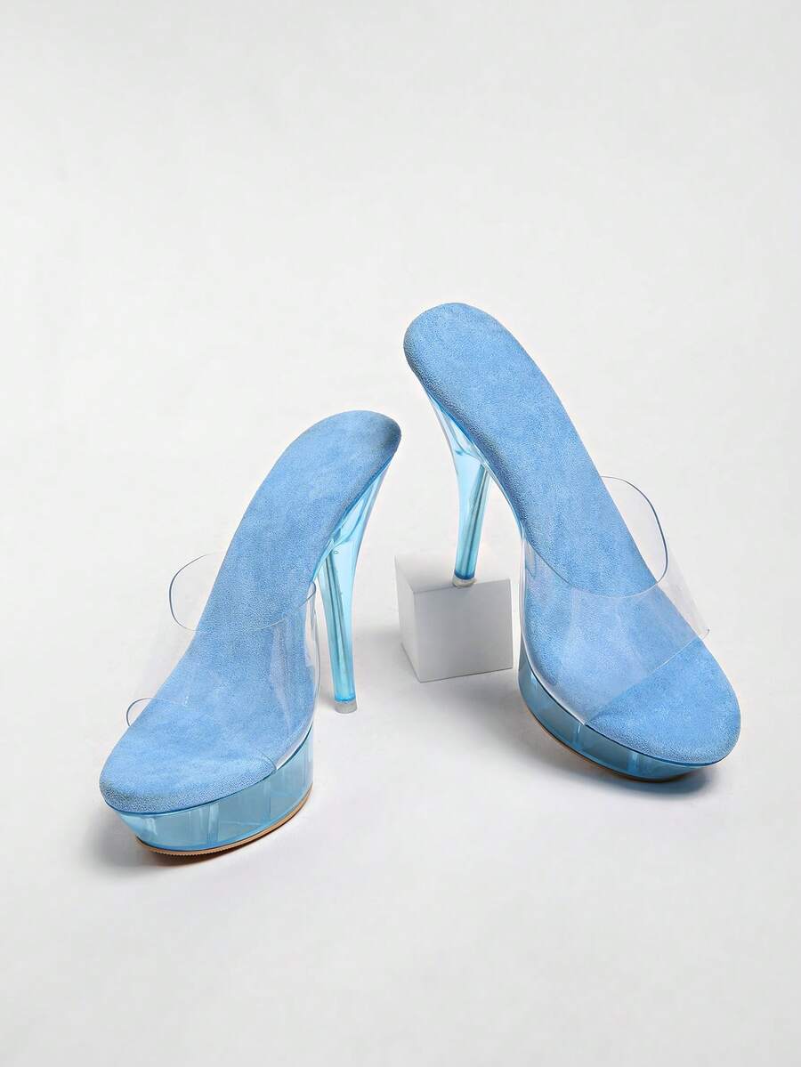 Transparent chunky heel platform slide sandals for women featuring clear PVC upper, open toe design, and ultra high heels.