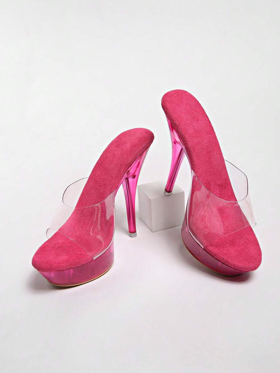 Transparent chunky heel platform slide sandals for women featuring clear PVC upper, open toe design, and ultra high heels.