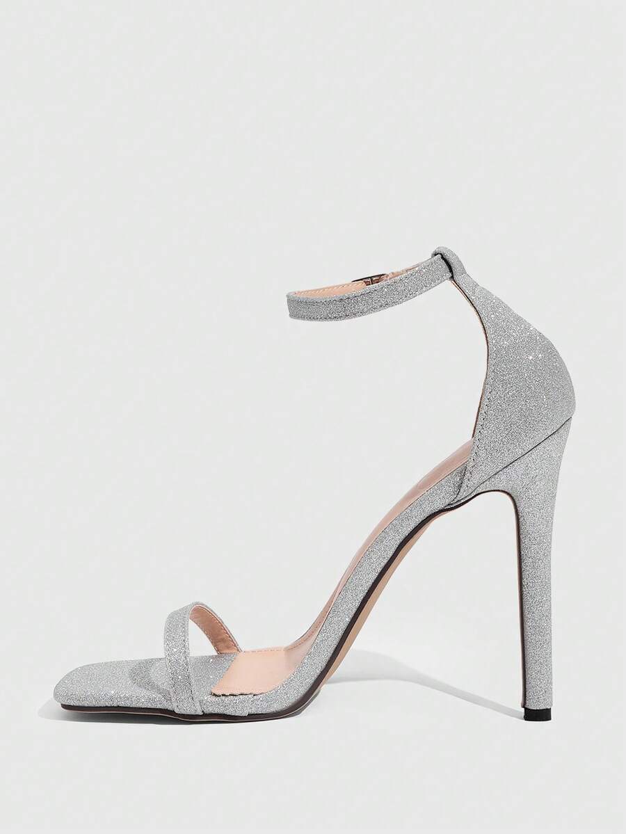 Square toe high-heeled sandals with thin straps, stiletto heel, and buckle ankle strap