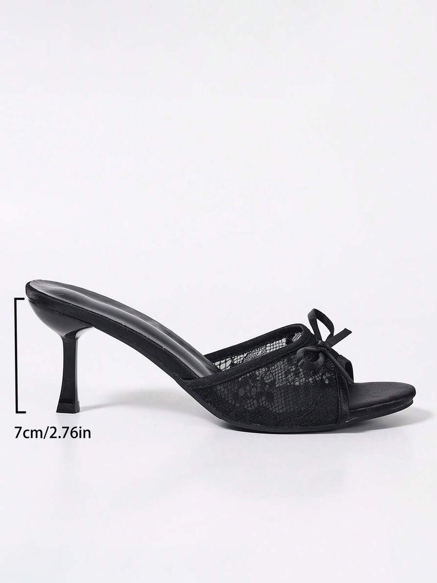 Women's black open toe mesh slide sandals with bowknot detail and stiletto heels