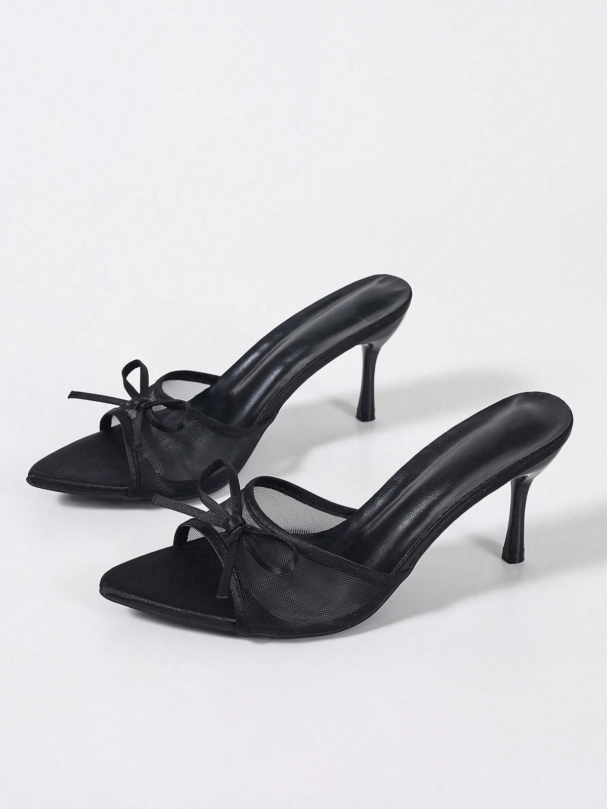 Women's black open toe mesh slide sandals with bowknot detail and stiletto heels