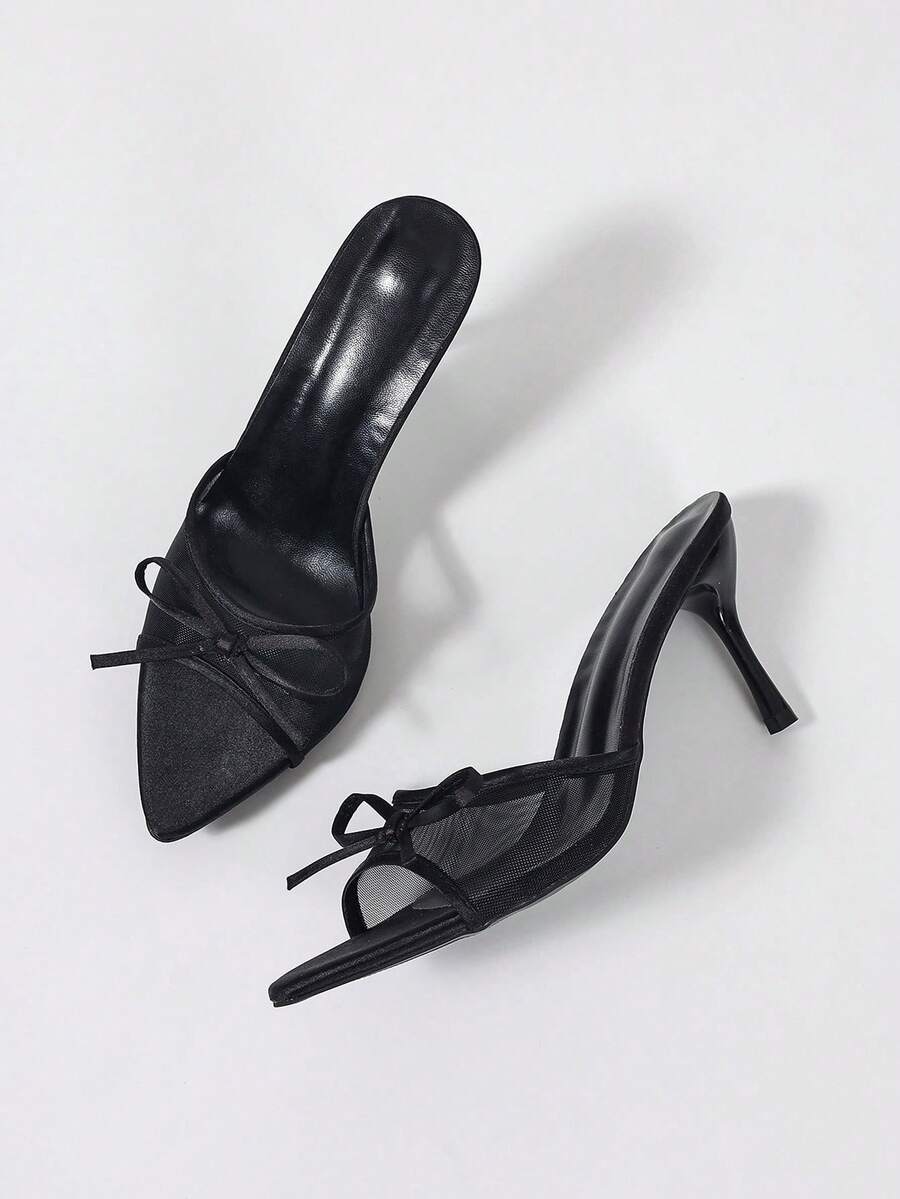 Women's black open toe mesh slide sandals with bowknot detail and stiletto heels