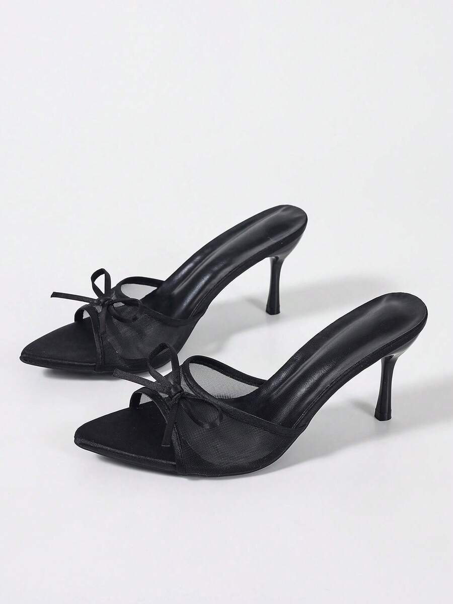 Women's black open toe mesh slide sandals with bowknot detail and stiletto heels