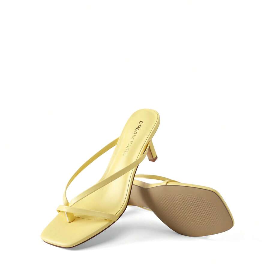 Women's metallic kitten low heel thong sandals featuring an open square toe and slip-on mule design.
