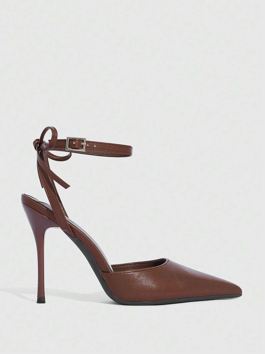 Women's pointed toe ankle strap stiletto high heel pumps featuring smooth PU leather and delicate buckle closure