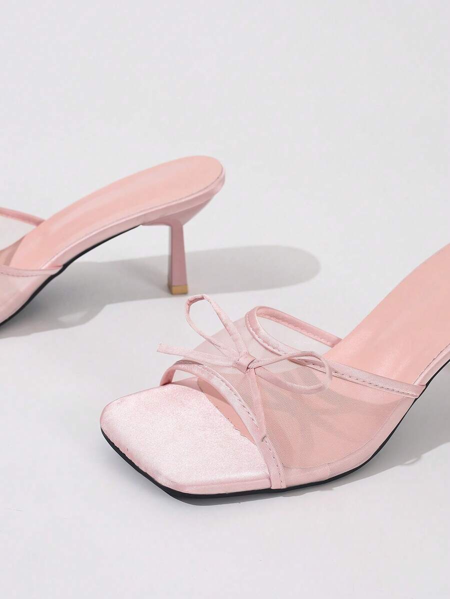 Women's black open toe mesh slide sandals with bowknot detail and stiletto heels