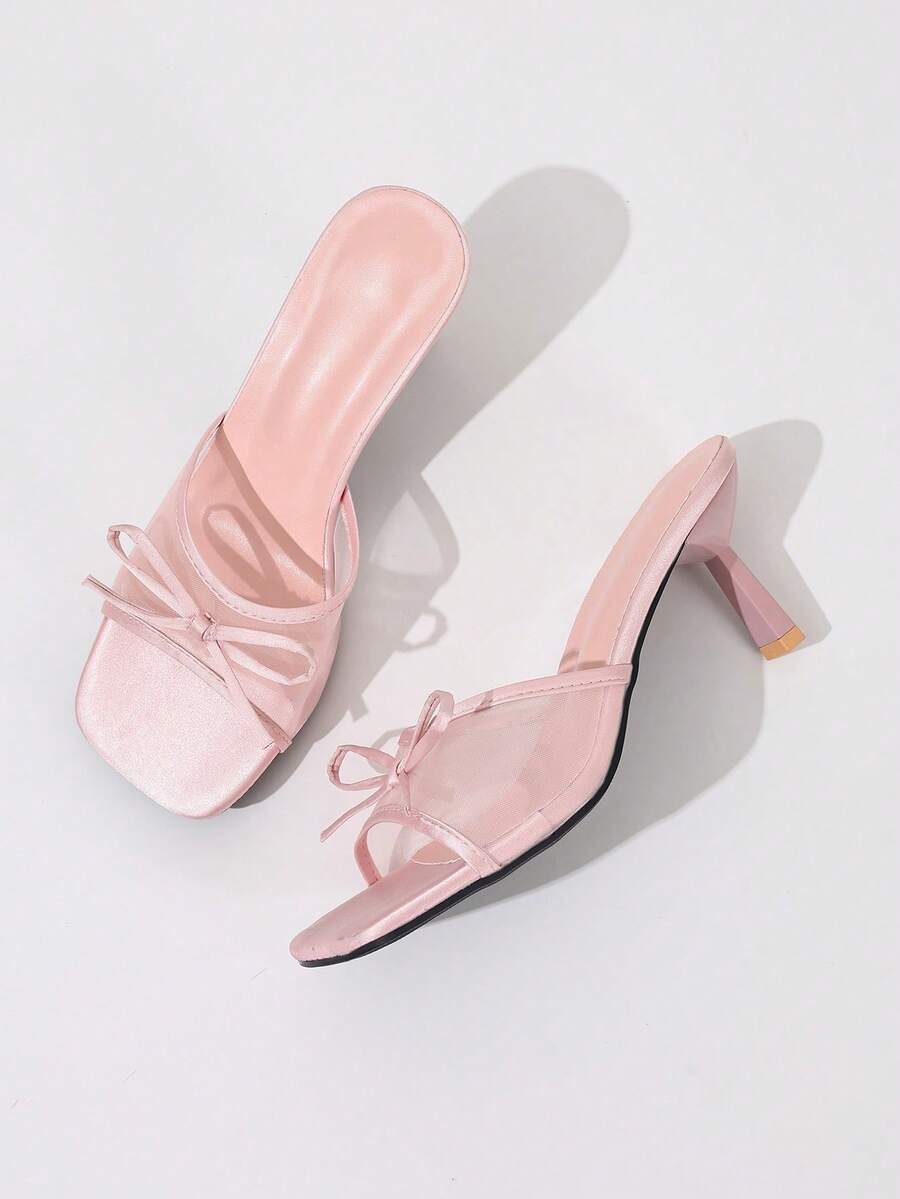 Women's black open toe mesh slide sandals with bowknot detail and stiletto heels
