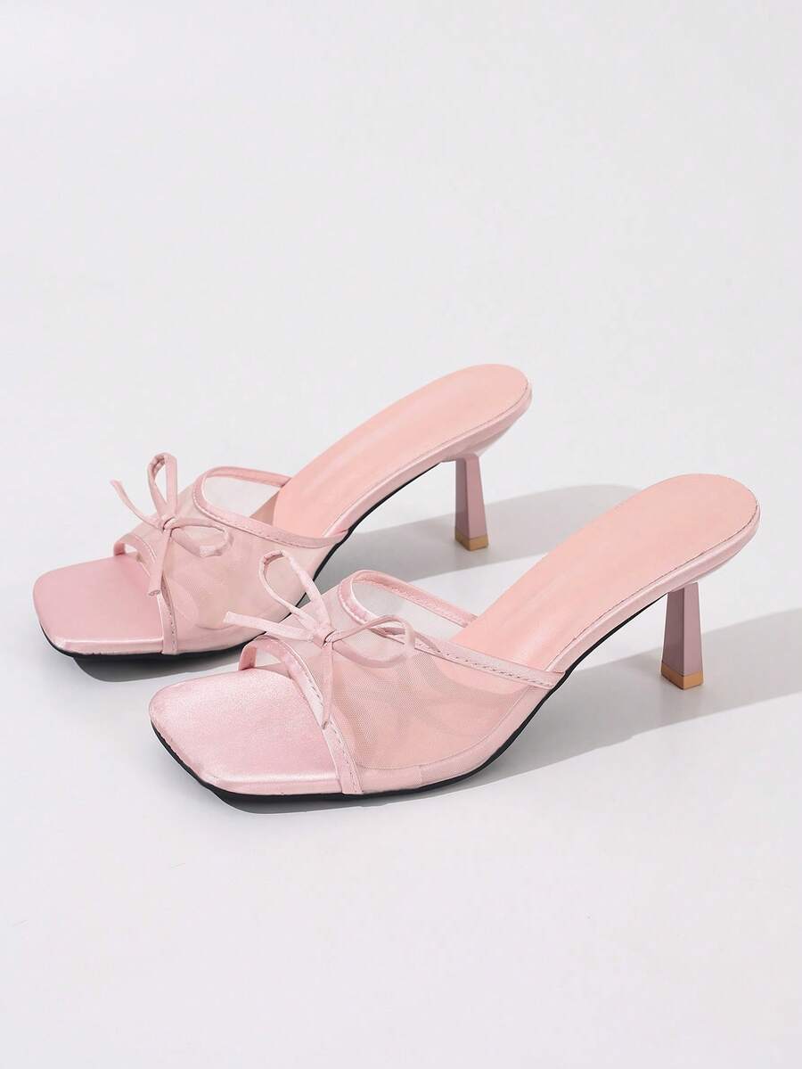 Women's black open toe mesh slide sandals with bowknot detail and stiletto heels