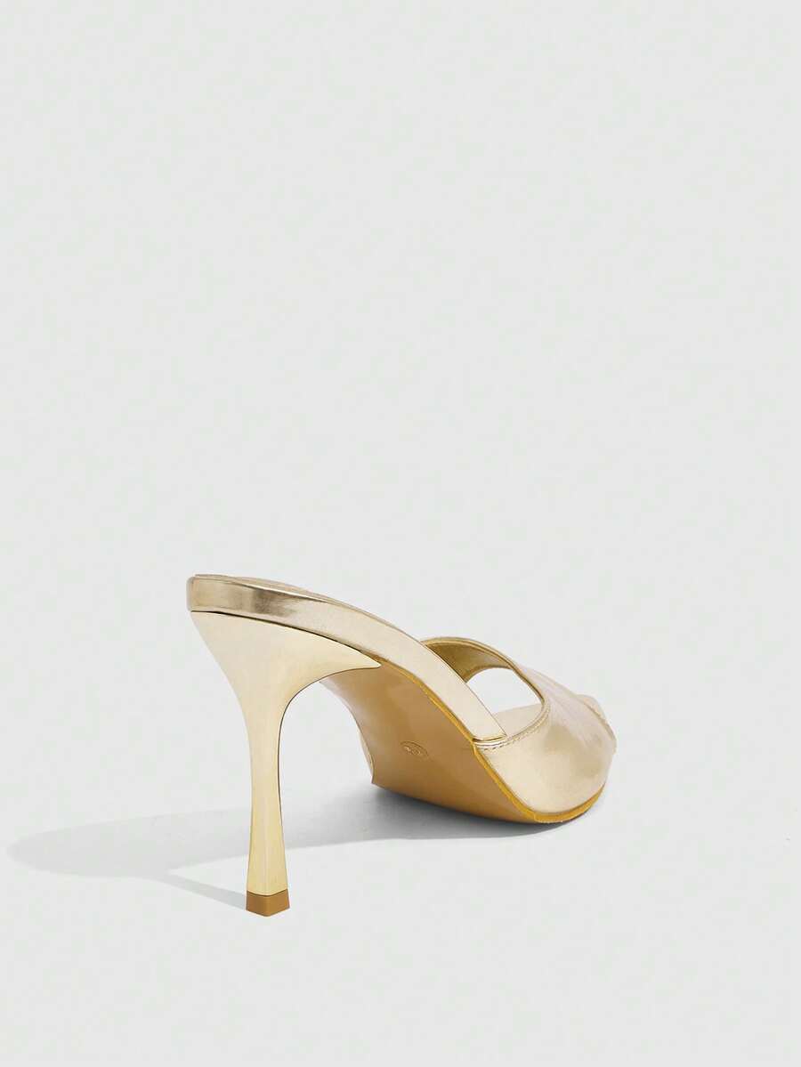 Women's black high heel sandals featuring contrast mesh upper, rhinestone embellishments, and a stiletto heel.