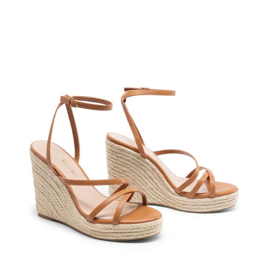 Women's strappy espadrille platform wedge sandals featuring an open toe design and adjustable ankle buckle strap