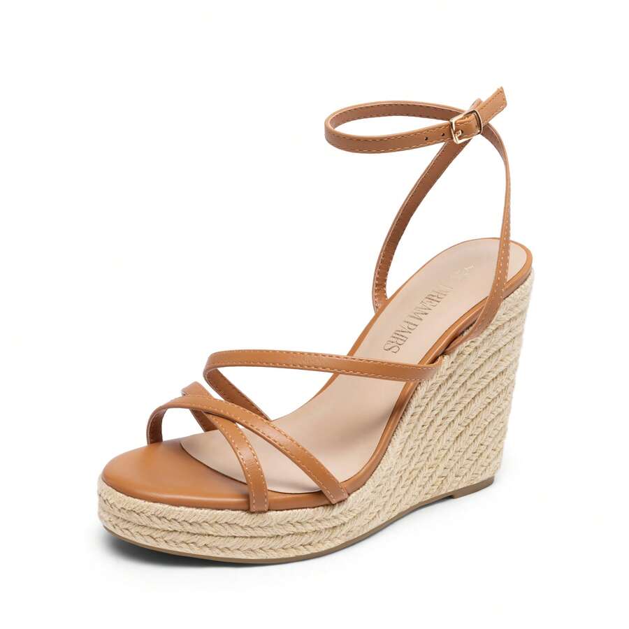 Women's strappy espadrille platform wedge sandals featuring an open toe design and adjustable ankle buckle strap