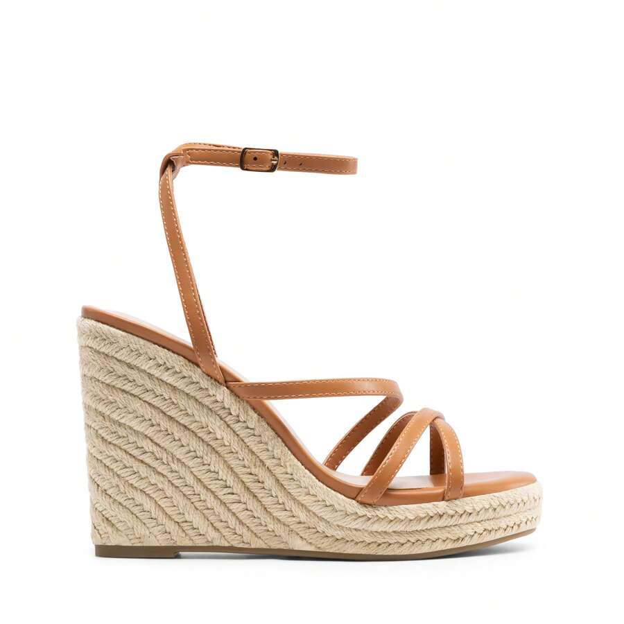 Women's strappy espadrille platform wedge sandals featuring an open toe design and adjustable ankle buckle strap