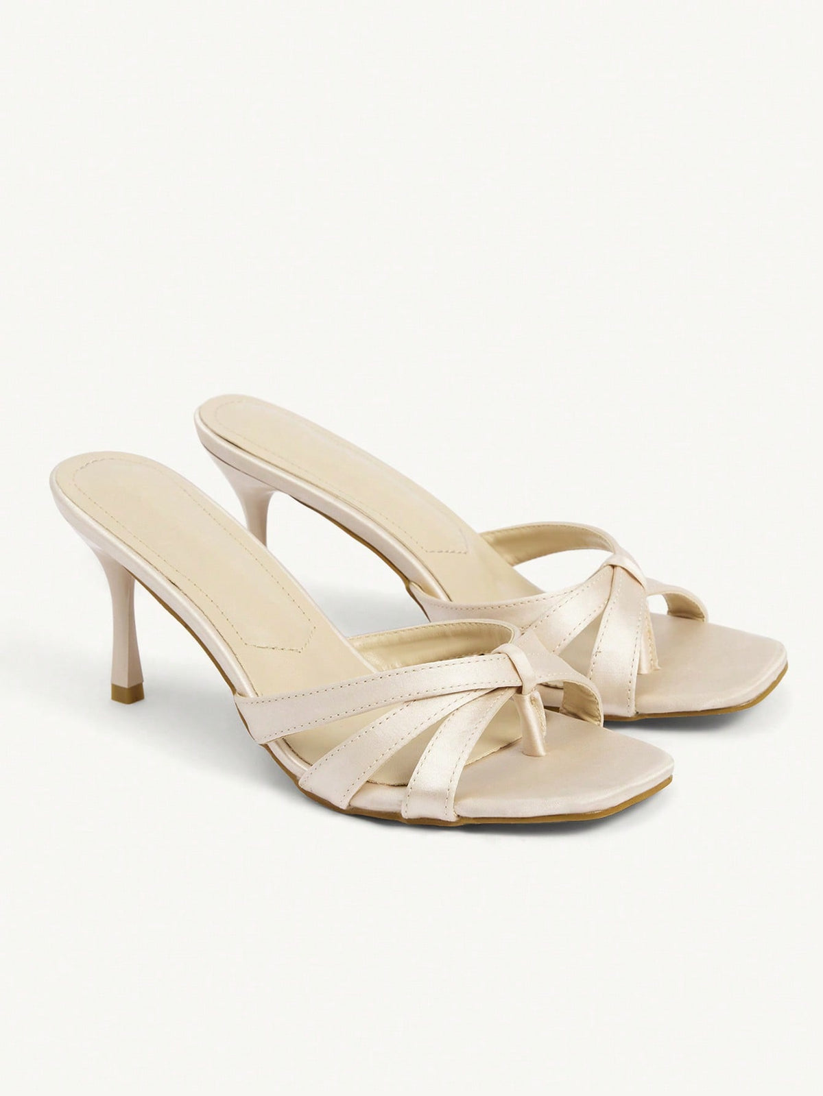 Square toe gold metallic heel sandals for women featuring open toe, crossover slingback strap, and stiletto mid heel for weddings and parties.