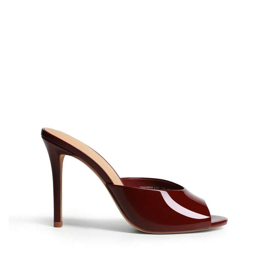 Women's peep toe stiletto mule sandals in white featuring a sleek high heel and slip-on design for party and wedding wear.