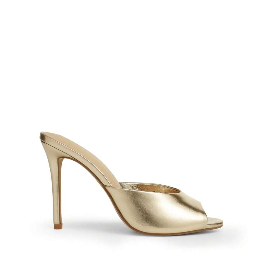 Women's peep toe stiletto mule sandals in white featuring a sleek high heel and slip-on design for party and wedding wear.