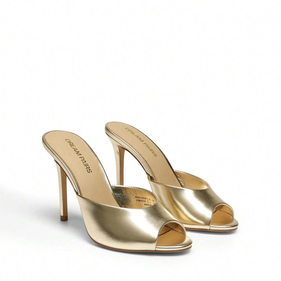 Women's peep toe stiletto mule sandals in white featuring a sleek high heel and slip-on design for party and wedding wear.