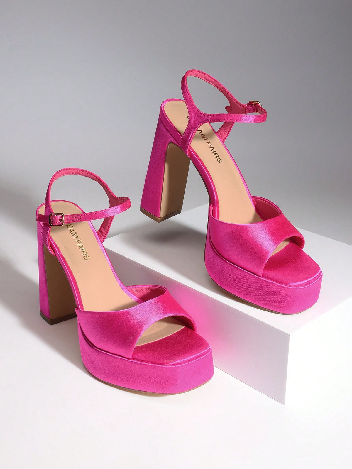 Women's open toe chunky high heel sandals featuring a platform sole, buckle ankle strap, and plain PU leather finish.