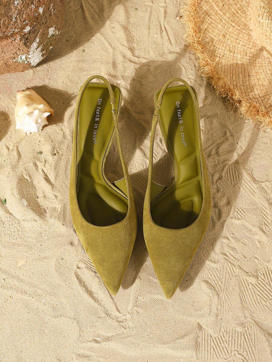 Women's elegant velvet kitten heel slingback pumps featuring a pointed closed toe and slip-on strap design.