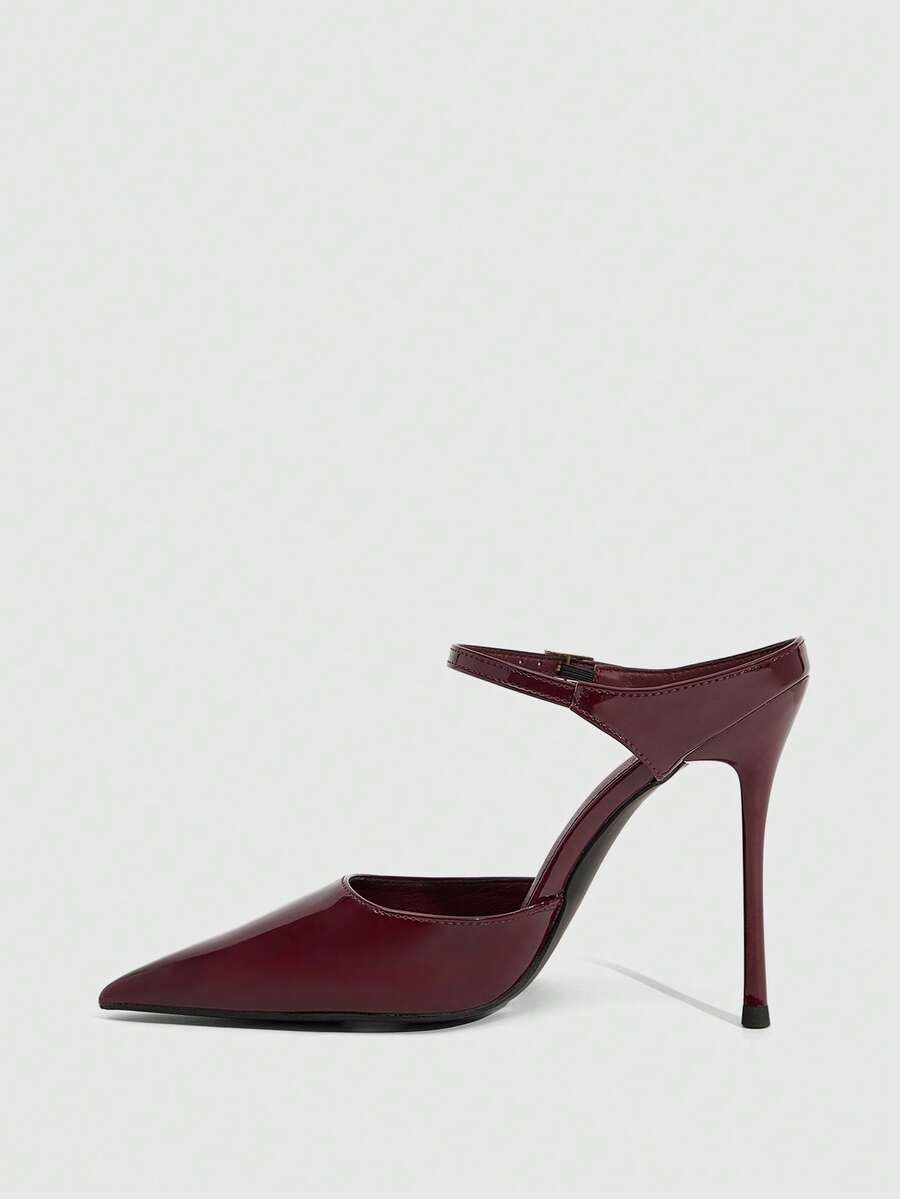 Burgundy pointed toe stiletto high heels with ankle strap buckle detail in patent PU leather