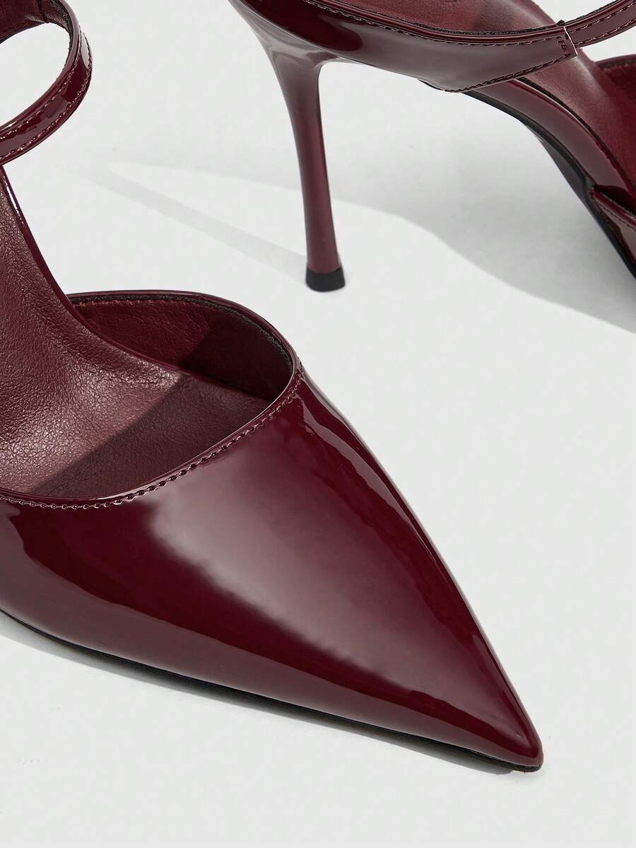 Burgundy pointed toe stiletto high heels with ankle strap buckle detail in patent PU leather