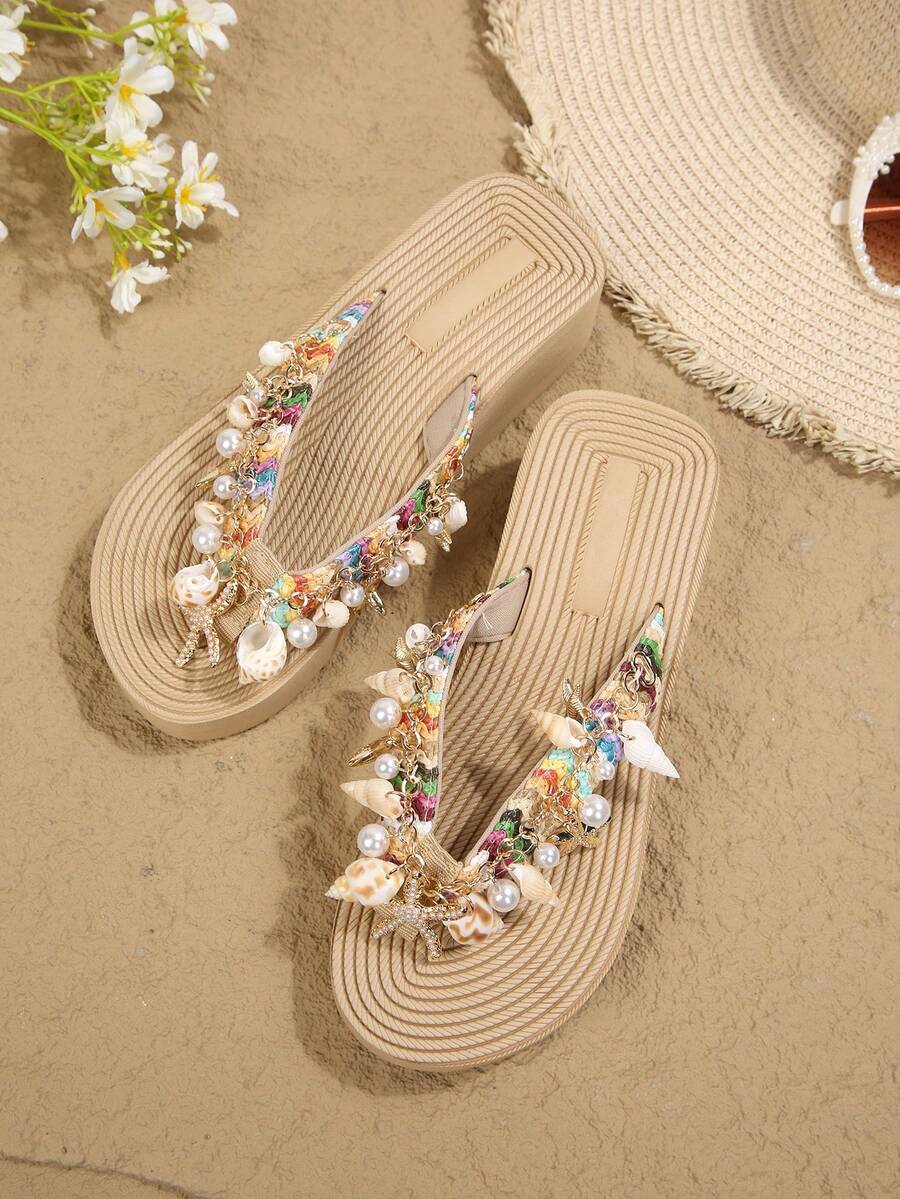 Beige platform wedge flip flop slippers featuring decorative chain and shell details with EVA sole for women.