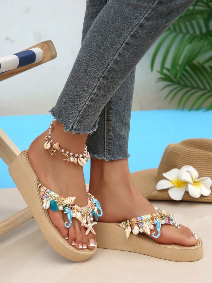 Beige platform wedge flip flop slippers featuring decorative chain and shell details with EVA sole for women.