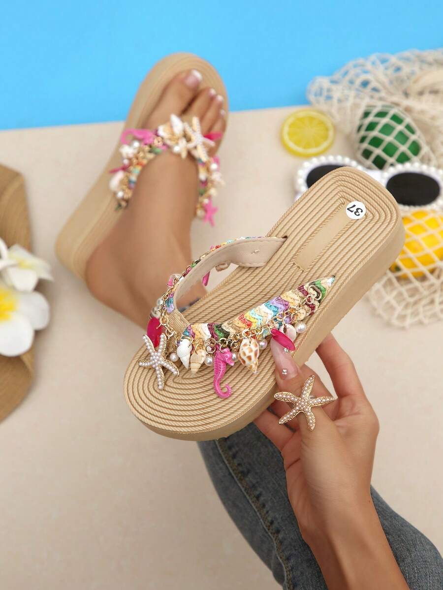 Beige platform wedge flip flop slippers featuring decorative chain and shell details with EVA sole for women.