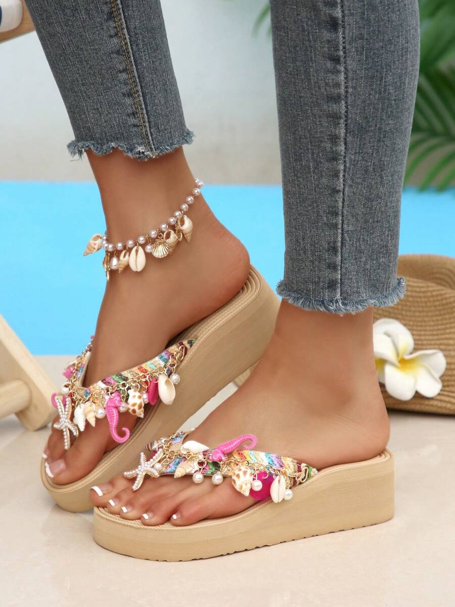 Beige platform wedge flip flop slippers featuring decorative chain and shell details with EVA sole for women.