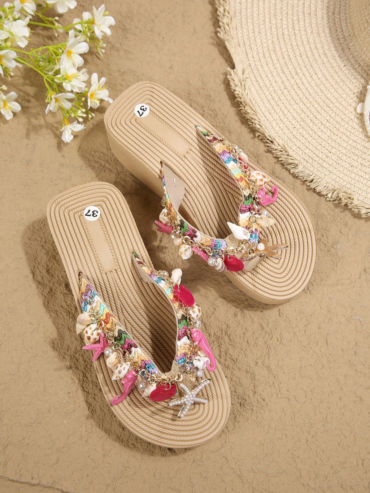 Beige platform wedge flip flop slippers featuring decorative chain and shell details with EVA sole for women.