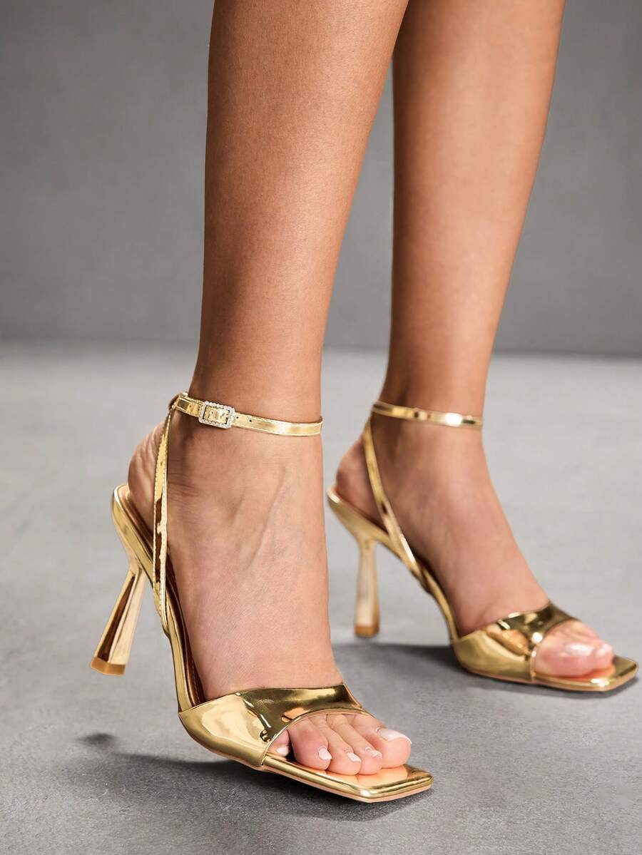 Women's open square toe stiletto high heel sandals featuring thin ankle straps and buckle closure.
