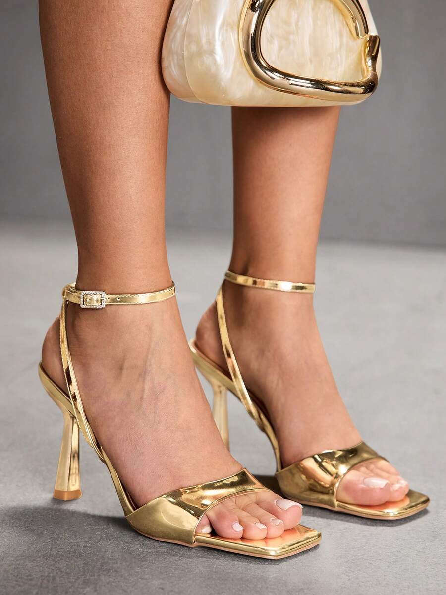 Women's open square toe stiletto high heel sandals featuring thin ankle straps and buckle closure.