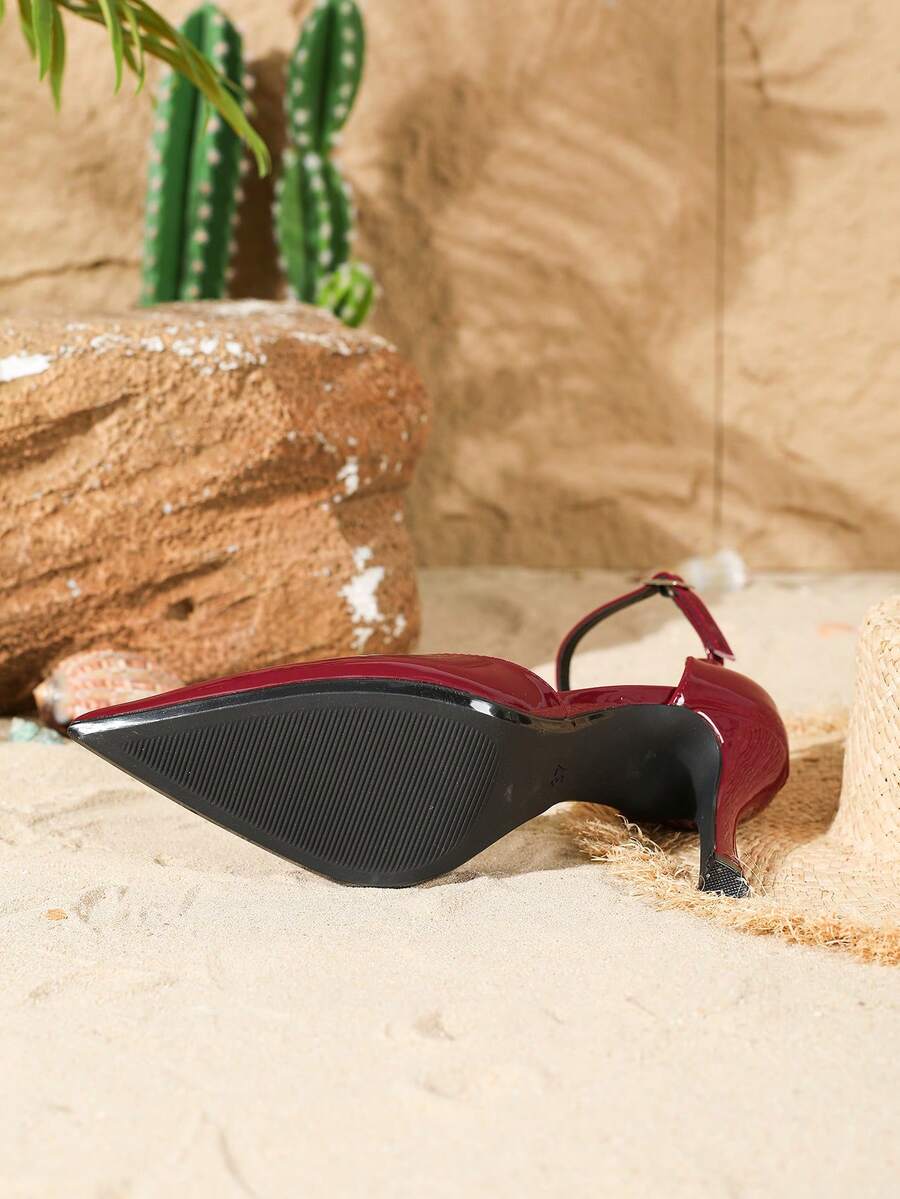 Elegant pointy-toe stiletto high heel pumps with hollow out sides and buckle ankle strap for weddings and evening dresses.