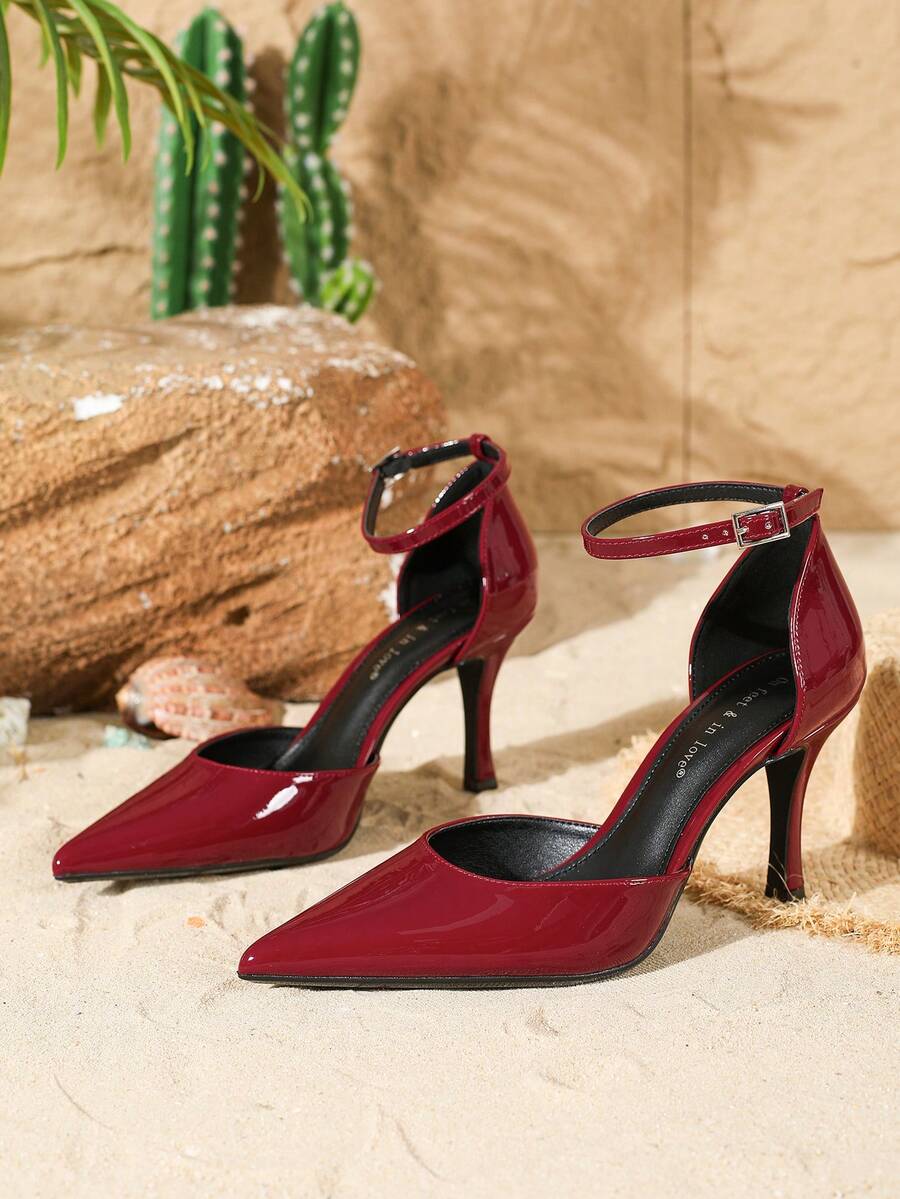 Elegant pointy-toe stiletto high heel pumps with hollow out sides and buckle ankle strap for weddings and evening dresses.