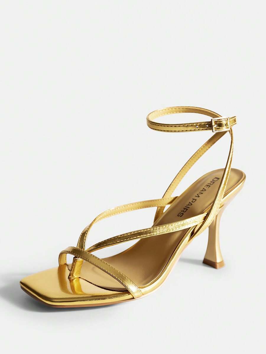 Open square toe kitten heel thong sandals with delicate cross-over straps and an adjustable ankle buckle strap.
