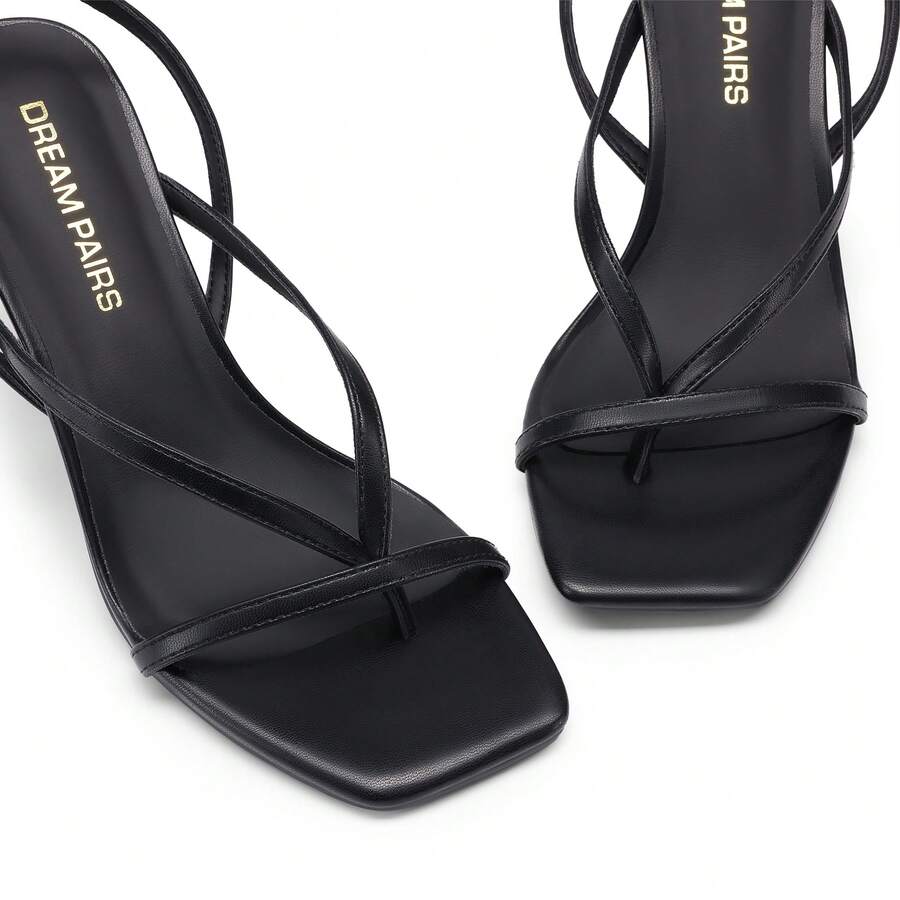 Open square toe kitten heel thong sandals with delicate cross-over straps and an adjustable ankle buckle strap.