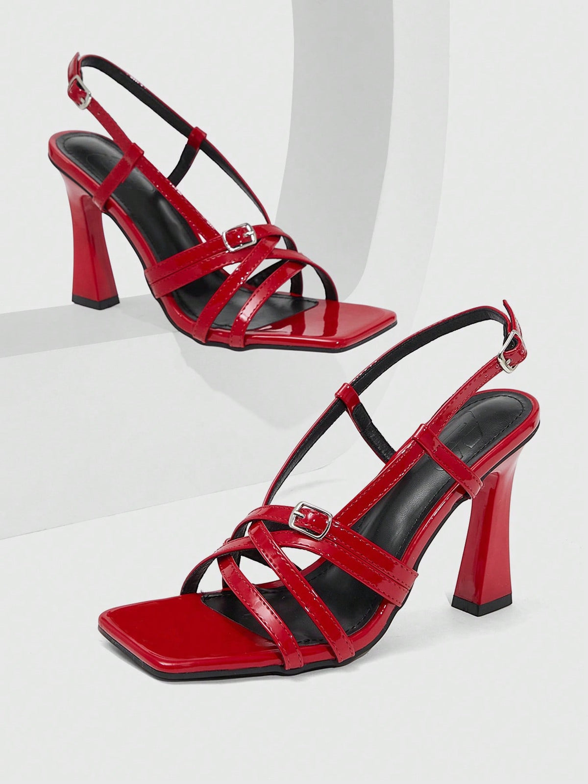 Women's square toe high heel sandals featuring cross straps, slingback heel support, and stiletto heels.