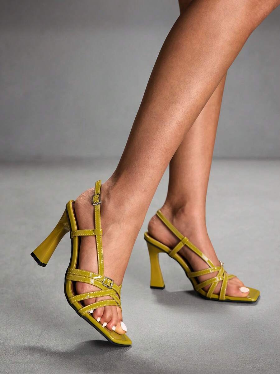 Women's square toe high heel sandals featuring cross straps, slingback heel support, and stiletto heels.