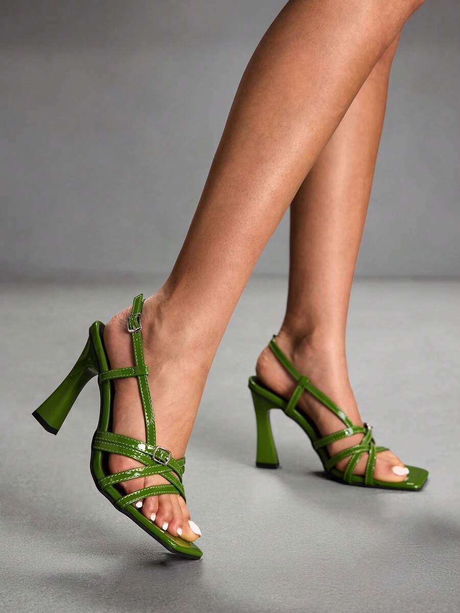 Women's square toe high heel sandals featuring cross straps, slingback heel support, and stiletto heels.