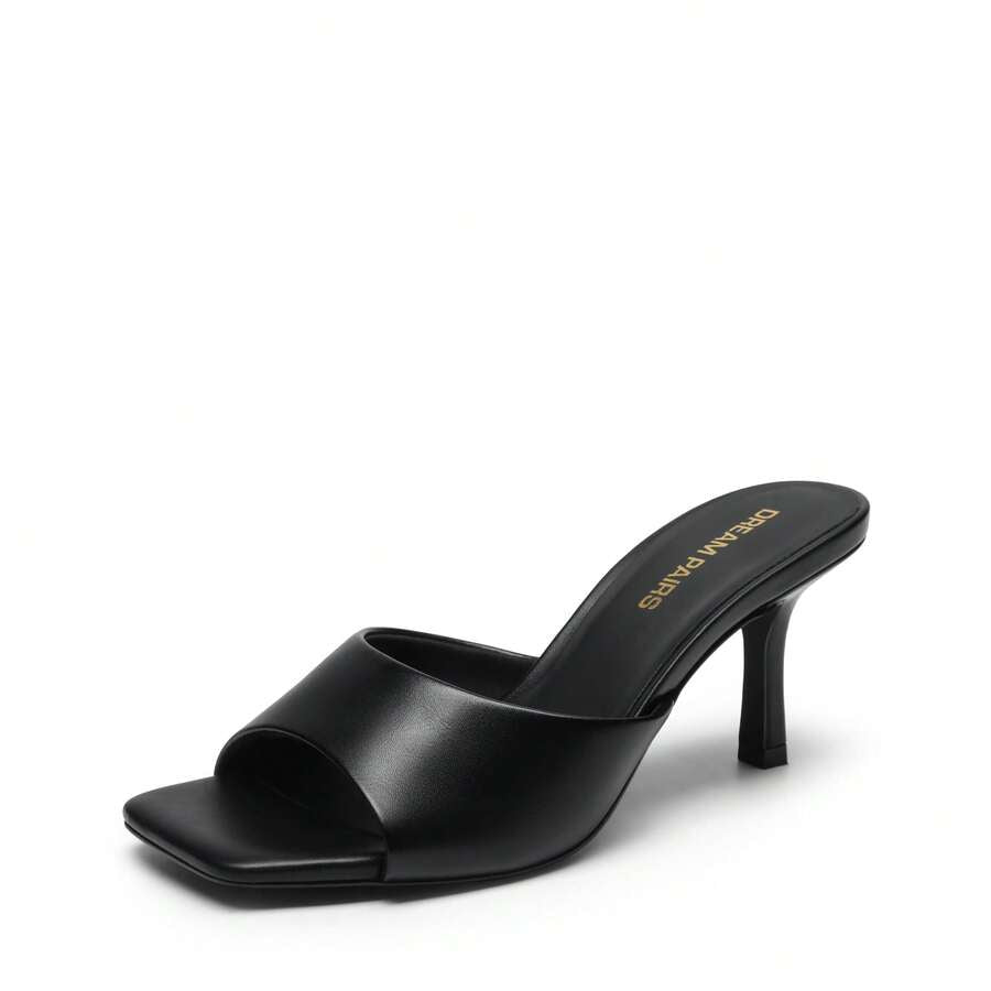 Pair of women's open square toe kitten heel mule sandals in white PU leather with slip-on styling.