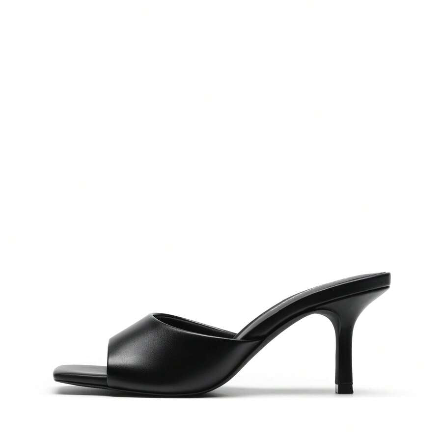 Pair of women's open square toe kitten heel mule sandals in white PU leather with slip-on styling.