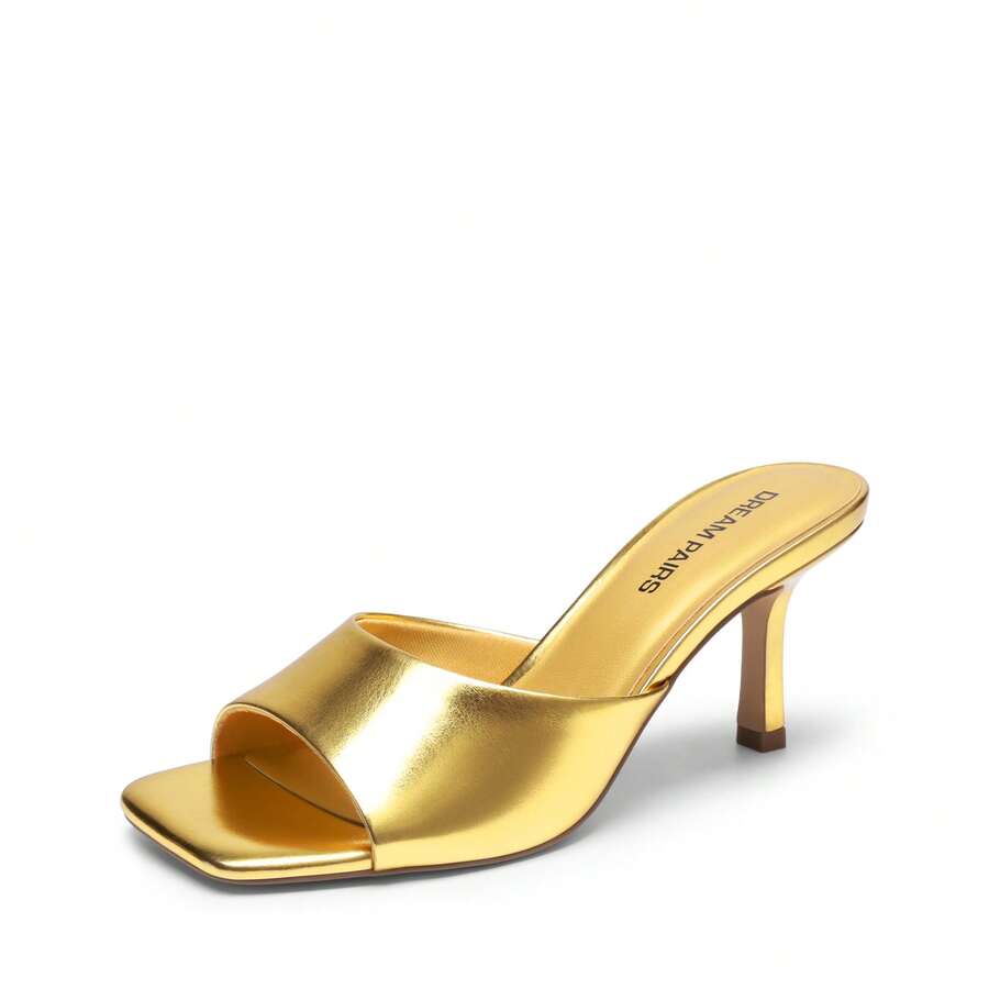 Pair of women's open square toe kitten heel mule sandals in white PU leather with slip-on styling.